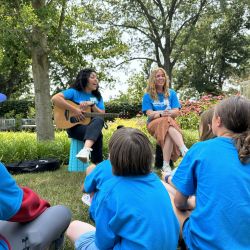 Childrens-Grief-Camp-Music-Activity Women playing guitars at children's grief camp
